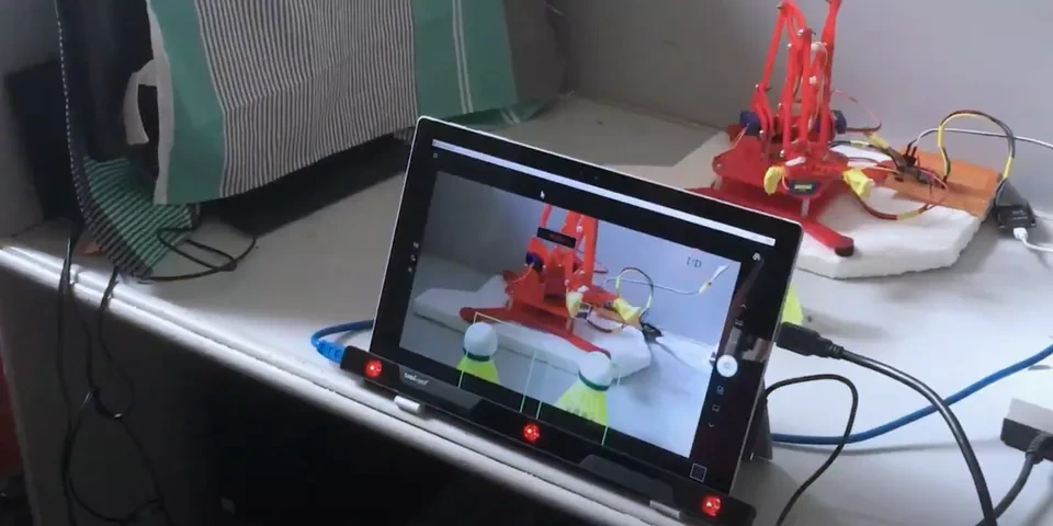 Eye Gaze Controlled Robotic Arm for Persons with Severe
Speech and Motor Impairment